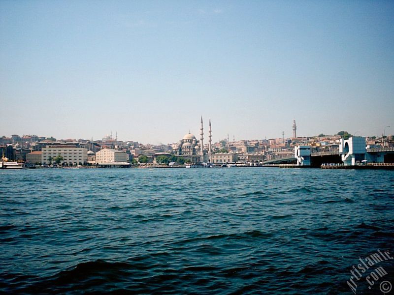 View of Eminonu coast, (from left) Sultan Ahmet Mosque (Blue Mosque), Yeni Cami (Mosque), (at far behind) Beyazit Mosque, Beyazit Tower and Galata Brigde from the shore of Karakoy in Istanbul city of Turkey.
